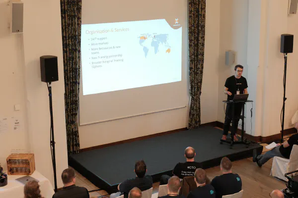 Speaker on stage in front of the audience